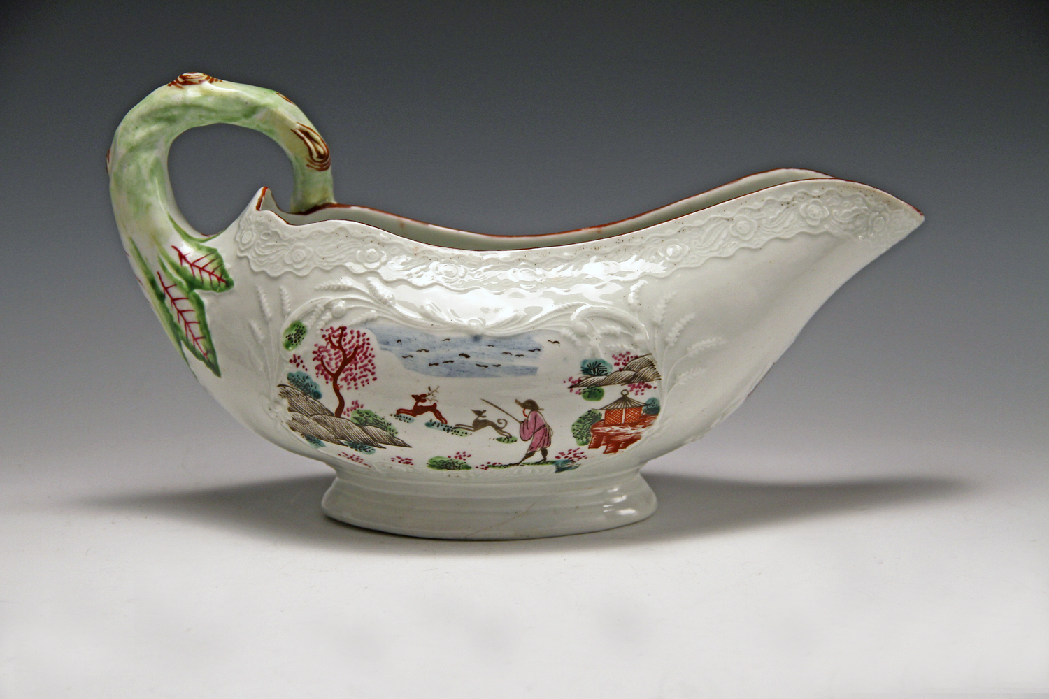 1037 - Very rare Worcester polychrome sauceboat with the "staghunt pattern" c 1755